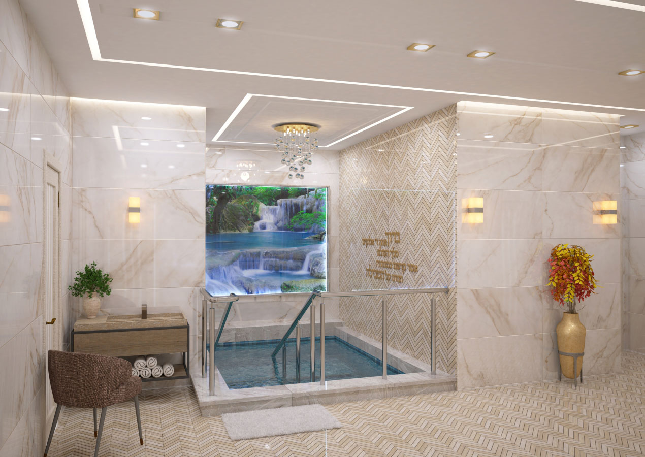 A room with cream-colored tiles, lights and a square deep bath that you enter by stairs.